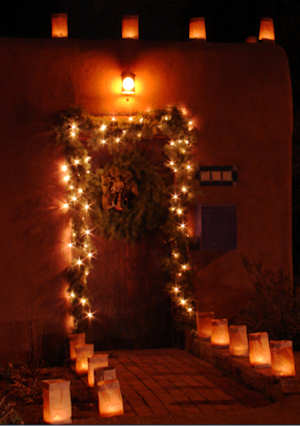 Christmas Doorway lit with Luminarias